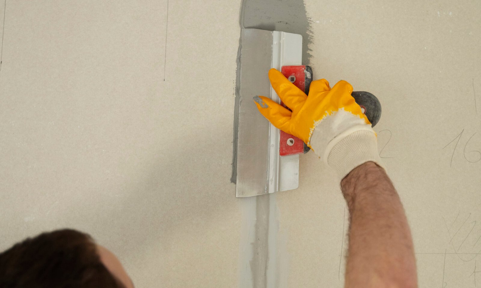 construction-worker-using-plastering-trowel